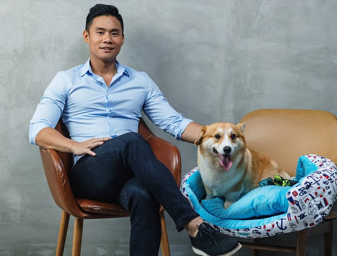 Doggo CEO Kurt Cheng with pet Corgi
